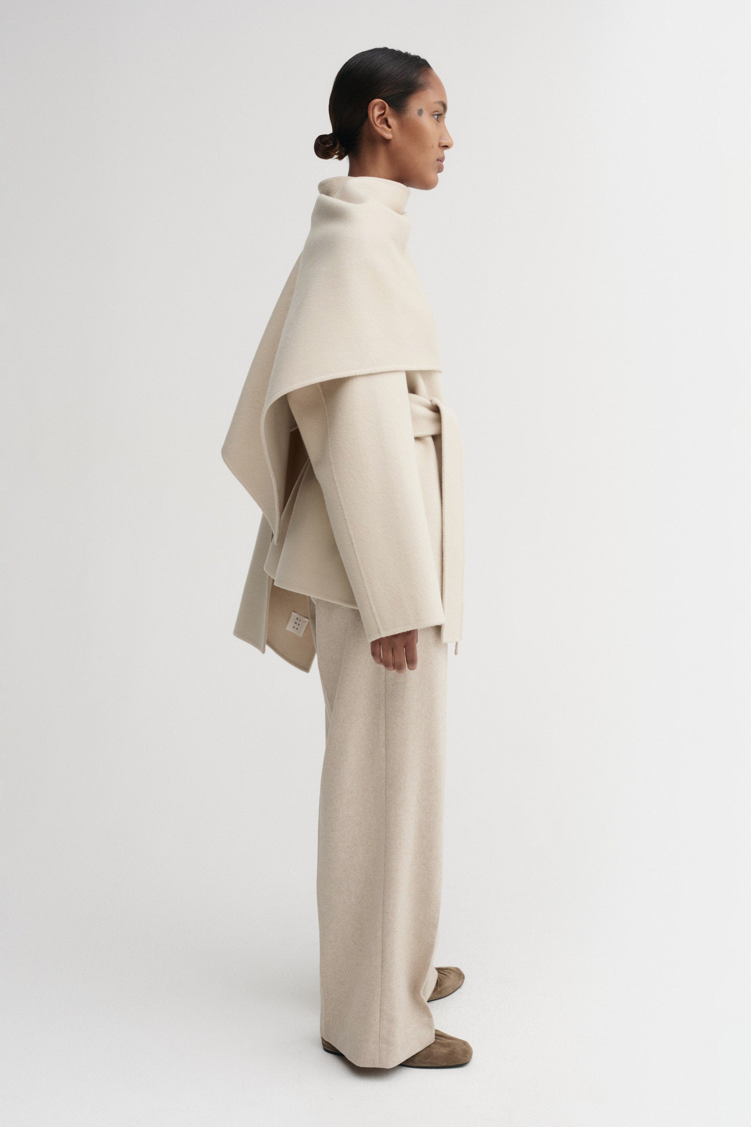 Noorie Doublé-Mantel, sand